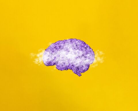 Brain Fog, Mood Swings and Mental Fatigue Concept and Banner. Brain and Clouds on Yellow Background. Minimal Aesthetics.