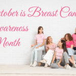 An image of young women sitting on a couch and discussing breast cancer. Text overlay says "October is Breast Cancer Awareness Month."