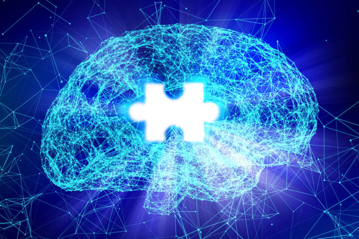 A digital representation of a human brain formed by interconnected glowing blue lines and nodes, symbolizing neural networks and scientific innovation. The brain has a bright, white puzzle piece-shaped gap in the center, signifying memory loss or cognitive challenges. The image has a futuristic aesthetic, with a dark blue background and subtle light flares, evoking themes of Alzheimer's research and advanced technology.