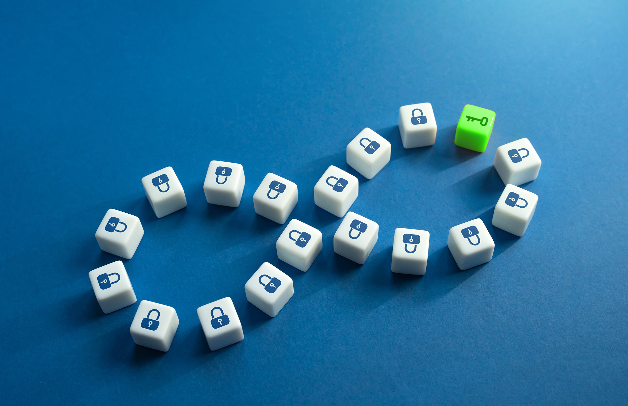 An infinity symbol composed of keyboard keys, with padlock icons representing security and a green key symbolizing unlocking potential. The image metaphorically connects to the concept of Blue Zones as regions where longevity secrets are 'unlocked,' emphasizing how their principles can serve as a key to healthier, longer lives.