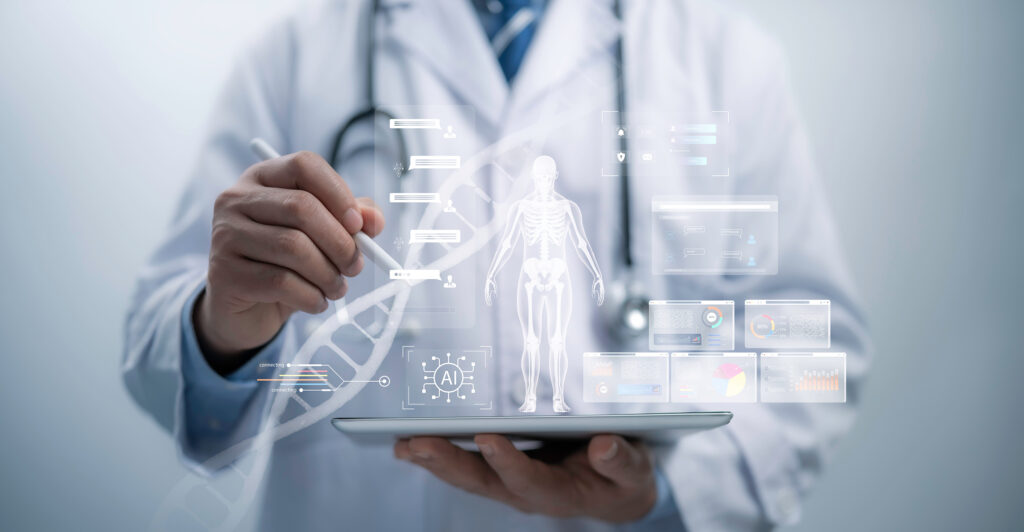 An image of a doctor holding a holograph-generating tablet. The holograph displayed is a human next, with multiple boxes containing characteristics of aging surrounding it, representing the biomarkers of aging.