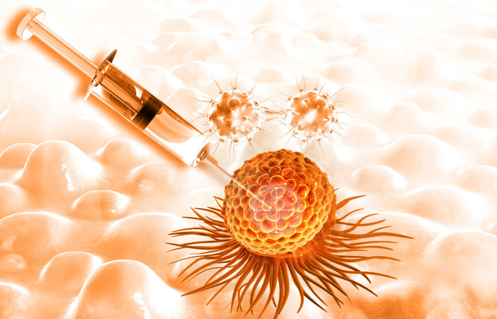 An image of a syringe targeting a cancer cell on an orange background. Two cancer cells are in the background about to be targeted by the new immunotherapy.