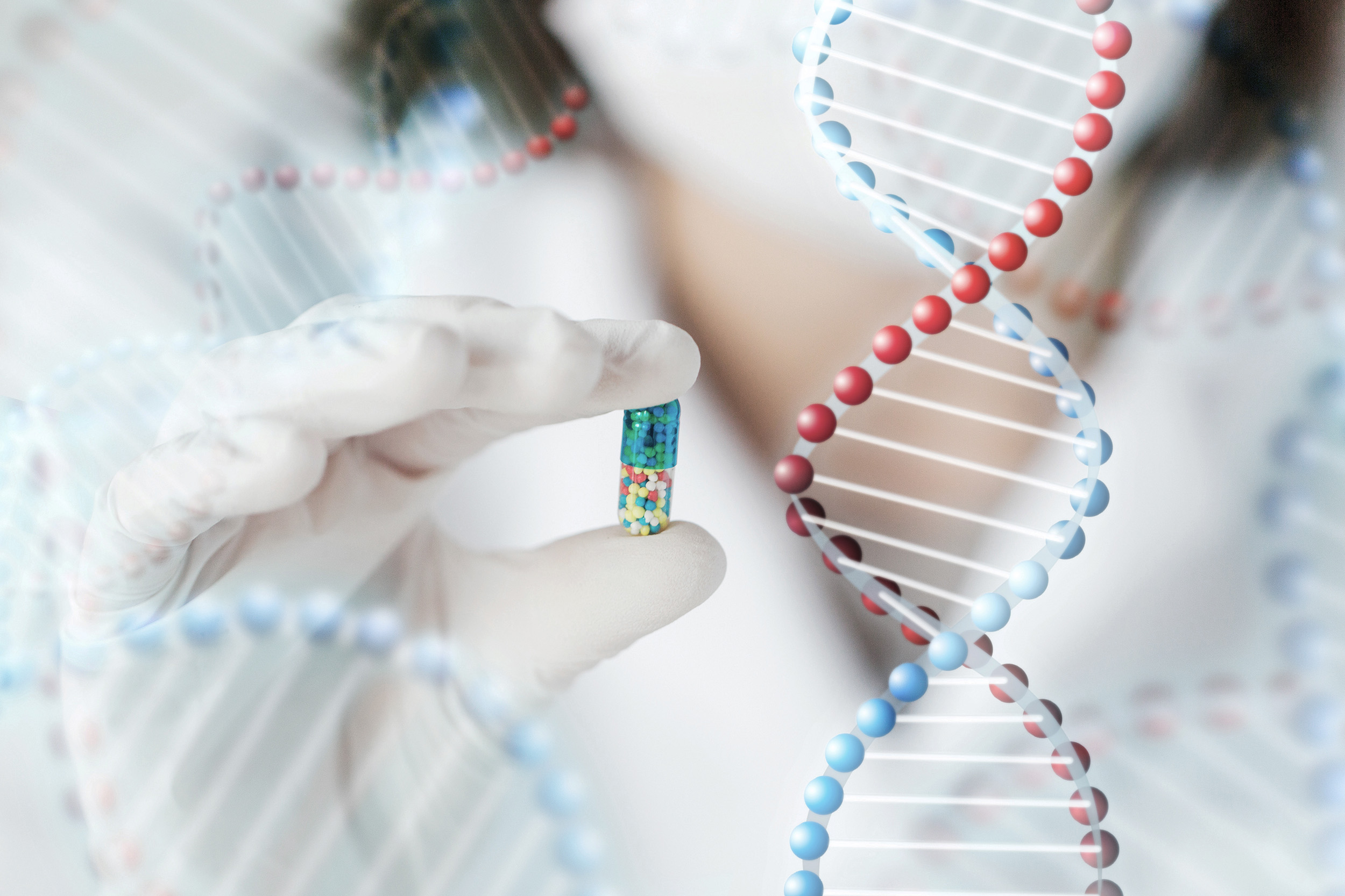 A researcher wearing white medical gloves holds a single capsule filled with multicolored microbeads, suspended against a soft-focus background of intertwining DNA double helices. The image symbolizes the fusion of genetics and medicine—precision therapies tailored to the individual—highlighting the promise of pharmacogenomics in shaping personalized, age-responsive treatments.